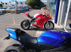 My bike next to Ducati Corse.png