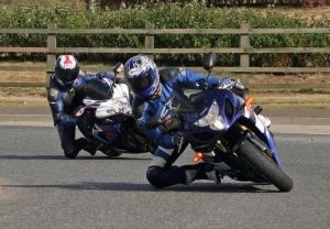 Me behind a mate videoing him roundabout surfing.