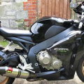 So this is how the bike looked the day I bought it .
The Akra has now gone and so has that hugger and loads of other stuff done .
More pics when I take them .........